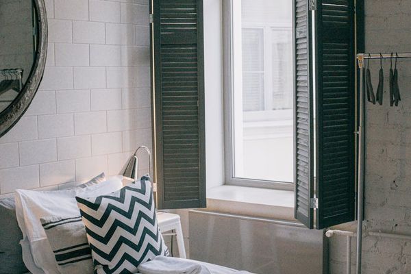 Minimalist yoga studio interior with soft natural light